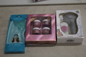 lot 246 image: Cooling Therapy Eye Mask, Smoke & Mirrors Soft Kisses, Exfoliator