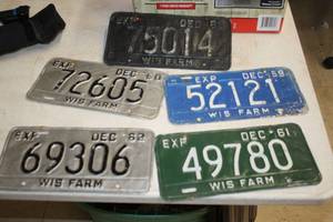 lot 282 image: Lot of (5) Vintage Wisconsin Farm License Plates - 1958, 1959, 1960, 1961, 1962