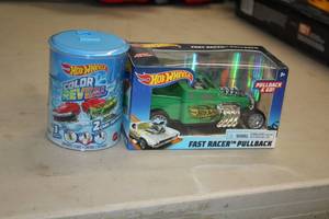 lot 313 image: Hot Wheels Fast Racer Pullback, Hot Wheels Color Reveal 2-car in Collectors Tin