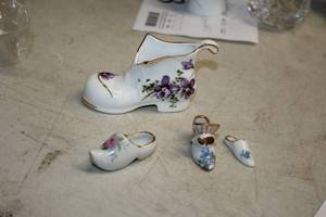 lot 332 image: Lot of (4) Assorted Collectors Porcelain Figurines - Boot, Shoe, Slipper, Wooden Shoe