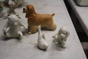 lot 329 image: Lot of (4) Assorted Figurines - (2) Dogs, (1) Bear, (1) Bird