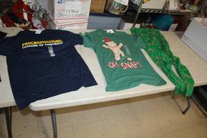 lot 373 image: Lot of (3) Size Medium Clothing - Gingerbread Man T-Shirt, Candy Lane Pants, Procrastinators T-Shirt