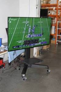 lot 12 image: Sharp Commercial-Grade Full HD 70 TV  Display  Monitor AND Ergotron Mobile Media Cart  Stand