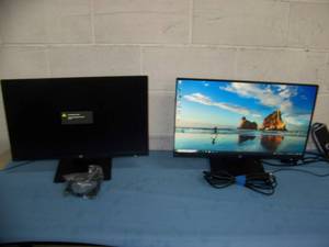 lot 31 image: (2) 23.8 HP (Hewlett Packard) Computer  PC Monitors on Stands