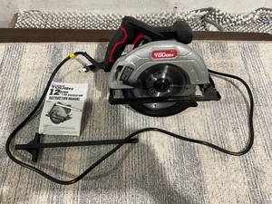 lot 120 image: Hyper Tough 12 Amp Corded 7-14 Circular Saw with Steel Plate Shoe