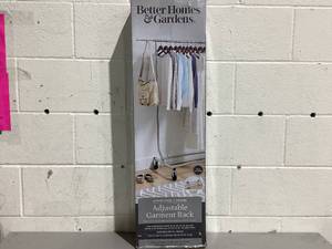 lot 440 image: Better Homes & Gardens 300lbs Heavy Duty Folding Adjustable Rolling Garment Rack