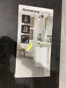 lot 516 image: Armstrong 12x24 Gray Travertine Vinyl Peel and Stick Tile