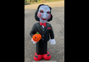lot 651 image: Gemmy 5 Halloween Saw Movie Jigsaw Inflatable Yard Decoration