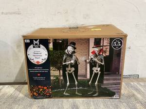 lot 36 image: Members Mark Musical Halloween Skeletons, Set of 2