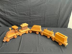 lot 140 image: Handcrafted Wooden Toy Train Set