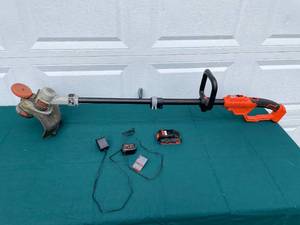 lot 7 image: Black & Decker 20V Cordless String Trimmer with Charger and Battery