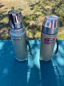 lot 68 image: Vintage Stanley and Uno-Vac Thermos Set