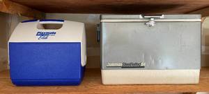 lot 85 image: Lot of 2 Coolers - Igloo Playmate Elite and Coleman Steel Belted 54