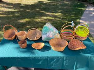 lot 93 image: Lot of Assorted Wicker and Plastic Baskets with Decorative Eggs