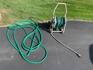 lot 274 image: Garden Hose with Reel and Extra Hose