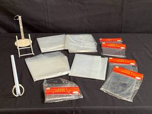 lot 164 image: Doll Display Stand and Protective Covers Lot