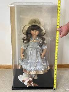lot 169 image: Collectible Porcelain Doll in Box with Hat and Dress