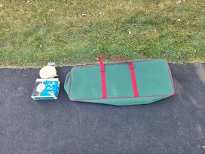 lot 311 image: Sunline Single Retractable Clothesline with Green Storage Bag