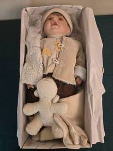 lot 407 image: Duck House Porcelain Infant Doll - Sean 24 Inch