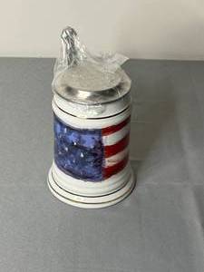 lot 515 image: Ceramic Beer Stein with American Flag Design and Pewter Lid
