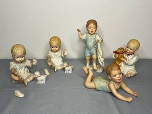 lot 518 image: Lenox Baby Book Collection Porcelain Figurines Set