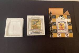 lot 488 image: Elvis Jukebox Musical Bank Collectors Item