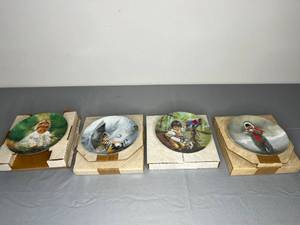 lot 465 image: Set of Four Collector Plates by Donald Zolan and Rusty Money