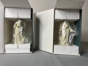 lot 580 image: Lenox Angel Candle Holders Pair