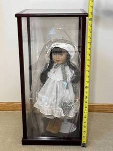 lot 168 image: Vintage Porcelain Doll in Display Case with Braided Hair