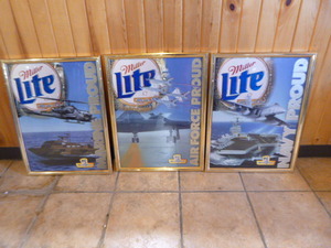 lot 44 image: 3 Miller Lite Armed Forces Framed Signs