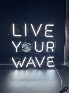 lot 70 image: White Claw Live Your Wave Neon Sign
