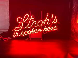 lot 56 image: Strohs Spoken Here Neon Sign