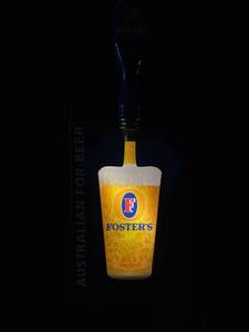lot 106 image: Fosters Motion Neon Sign
