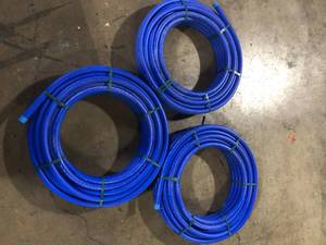 Lot of Advanced Drainage Systems 1 in. x 100 ft. CTS 250 PSI NSF Poly Pipe in Blue  Customer Returns See Pictures