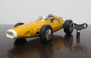 lot 1 image: Vintage SCHUCO Micro-Racer Race Car wKey - Yellow Ferrari