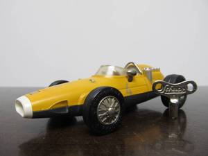 lot 5 image: Vintage SCHUCO Micro-Racer Race Car wKey - Yellow Ferrari