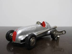 lot 24 image: Vintage SCHUCO Micro-Racer Race Car wKey - Silver wRed Mercedes Modell 1935