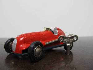 lot 25 image: Vintage SCHUCO Micro-Racer Race Car wKey - Red wSilver Mercedes Modell 1935