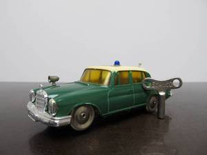 lot 35 image: Vintage SCHUCO Micro-Racer Car - Green & White Polizei Mirako-Car