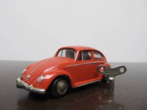 lot 43 image: Vintage SCHUCO Micro-Racer Race Car wKey - Salmon Colored Volkswagen