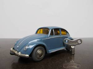 lot 46 image: Vintage SCHUCO Micro-Racer Race Car wKey - Greyish Blue wYellow Windows Volkswagen