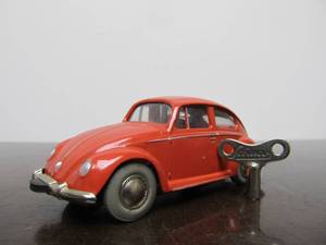 lot 50 image: Vintage SCHUCO Micro-Racer Race Car wKey - Salmon Colored Volkswagen