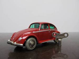lot 54 image: Vintage SCHUCO Micro-Racer Race Car wKey - Red Volkswagen wBlue Green Windows
