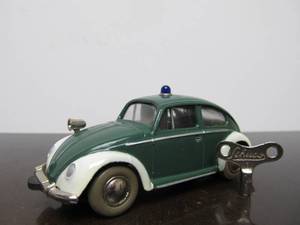 lot 59 image: Vintage SCHUCO Micro-Racer Race Car wKey - Green & White Volkswagen wSiren