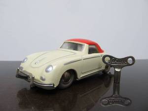 lot 73 image: Vintage SCHUCO Micro-Racer Race Car wKey - White & Red Porsche