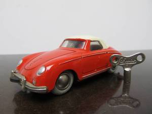 lot 77 image: Vintage SCHUCO Micro-Racer Race Car wKey - Red & White Porsche