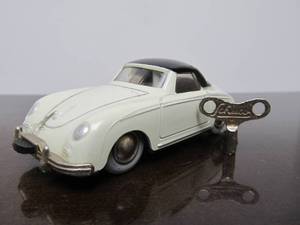 lot 78 image: Vintage SCHUCO Micro-Racer Race Car wKey - White & Black Porsche