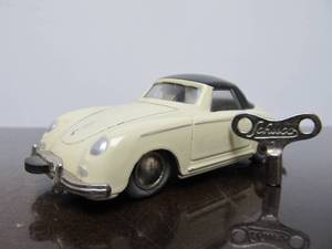 lot 79 image: Vintage SCHUCO Micro-Racer Race Car wKey - CreamBlack Porsche