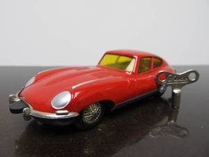 lot 87 image: Vintage SCHUCO Micro-Racer Car wKey - Red Jaguar E-Type wYellow Windows