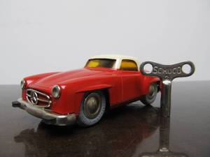 lot 88 image: Vintage SCHUCO Micro-Racer Car wKey - Red & White Mercedes 190SL wYellow Windows